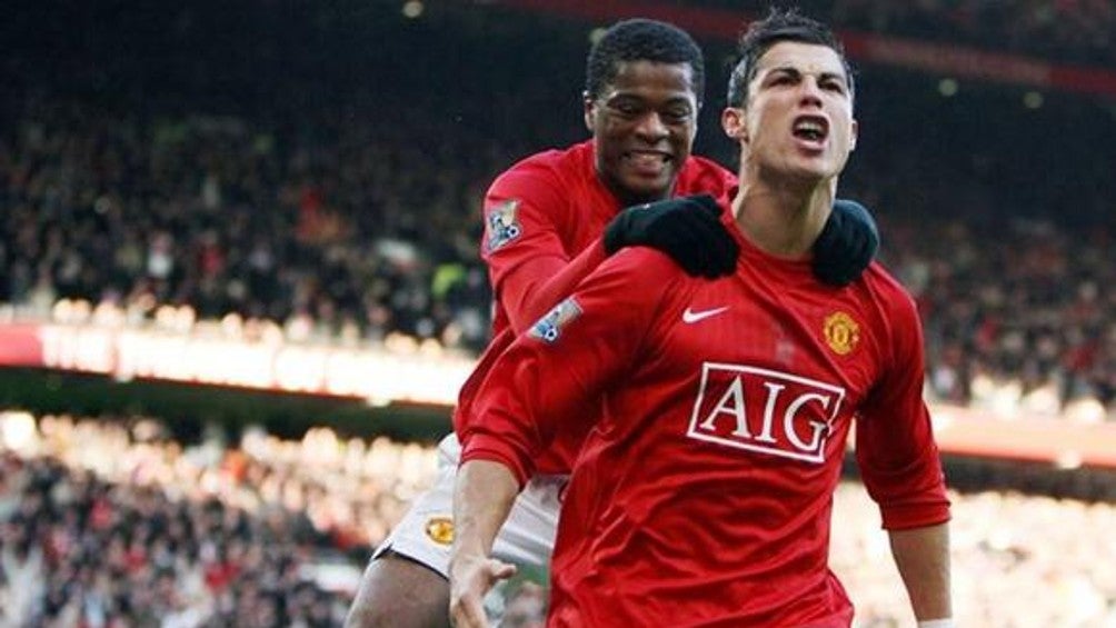 Evra y Cristiano durante un partido del United