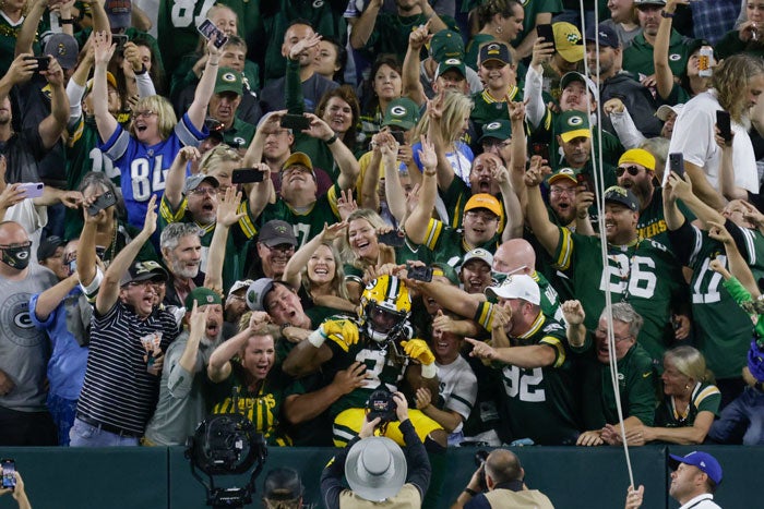 El corredor celebrando uno de sus cuatro touchdowns contra los Lions