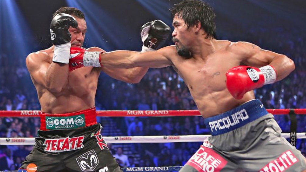 Márquez impacta el rostro de Pacquiao 