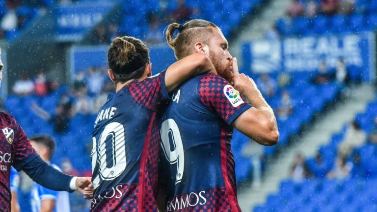 Jugadores del Huesca, en festejo de gol