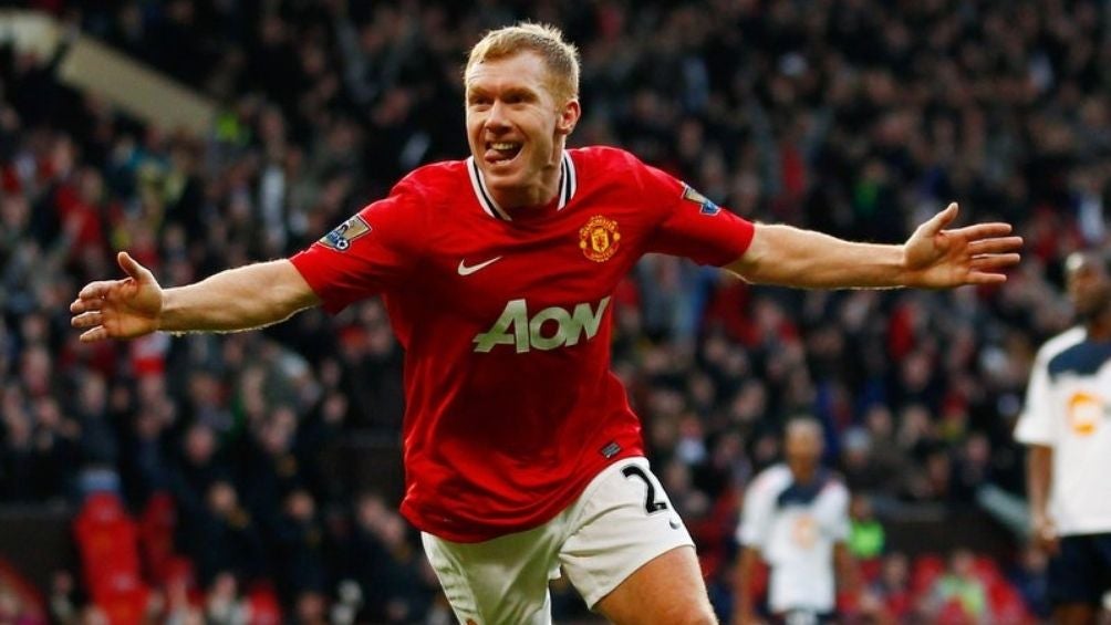 Scholes en un partido con el United