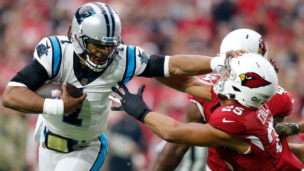 Cam Newton supera tacleadas para lograr un TD