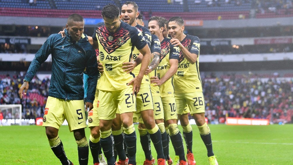 Jugadores de América en festejo