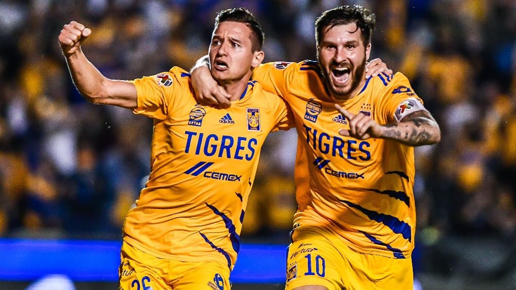 Florian Thauvin y Gignac festejando gol con los Tigres ante León