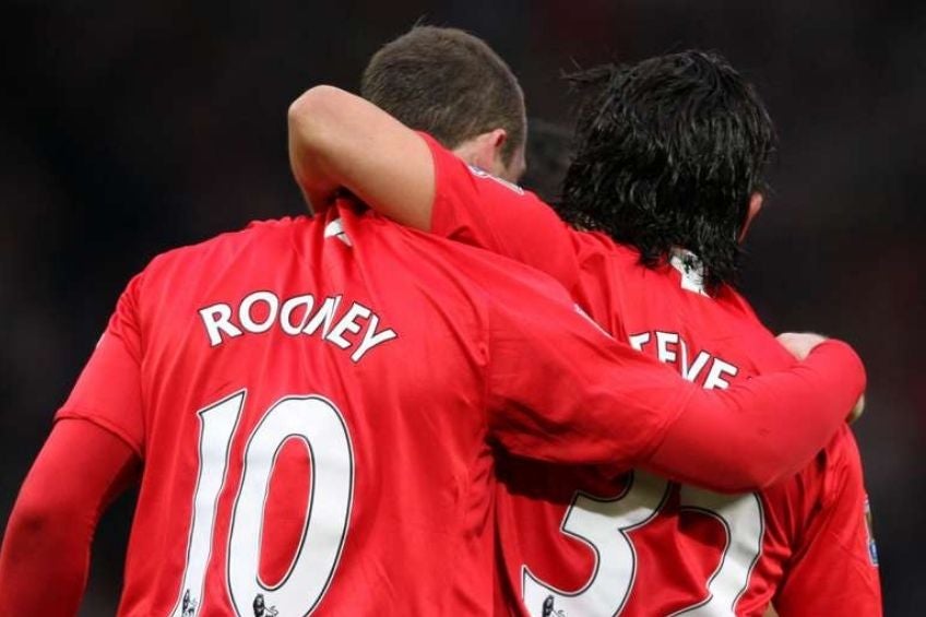 Rooney y Tevez en el United