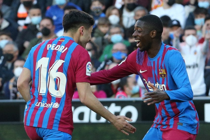 Jugadores del Barcelona festejando en gol a favor