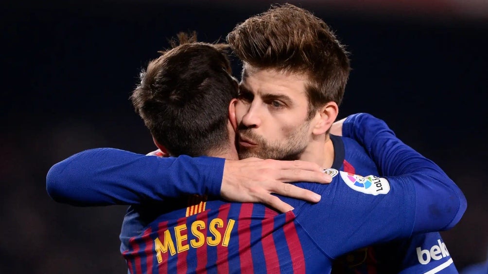 Messi y Piqué en celebración de gol 