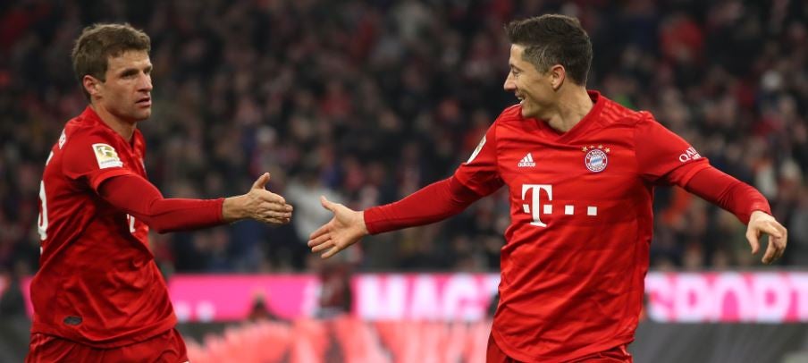 Lewandowski y Müller en festejo de una diana