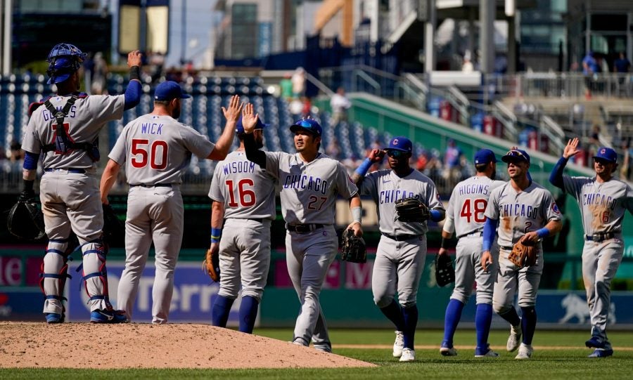 Jugadores de los Cubs celebran victoria