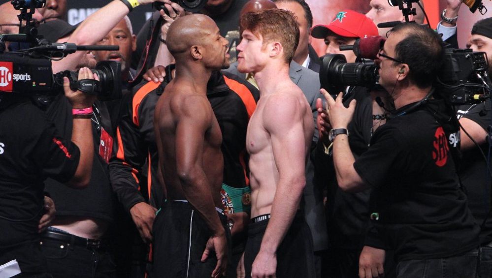 Floyd Mayweather y Canelo Álvarez previo a su pelea