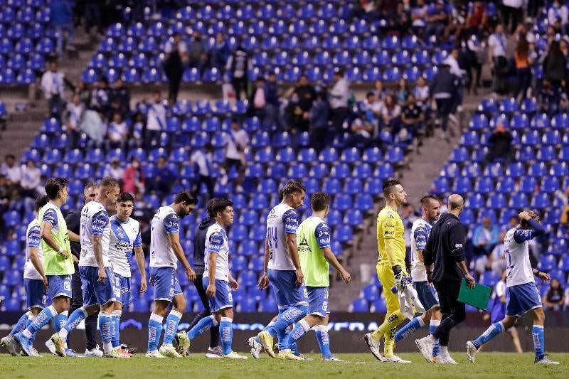 Jugadores de Puebla en lamento