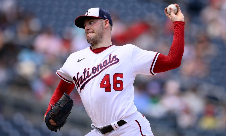 Patrick Corbin lanzando ante Reds