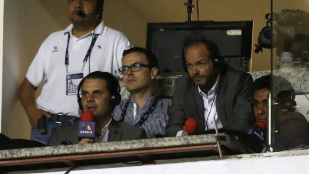 Martinoli, García y Campos en un estadio