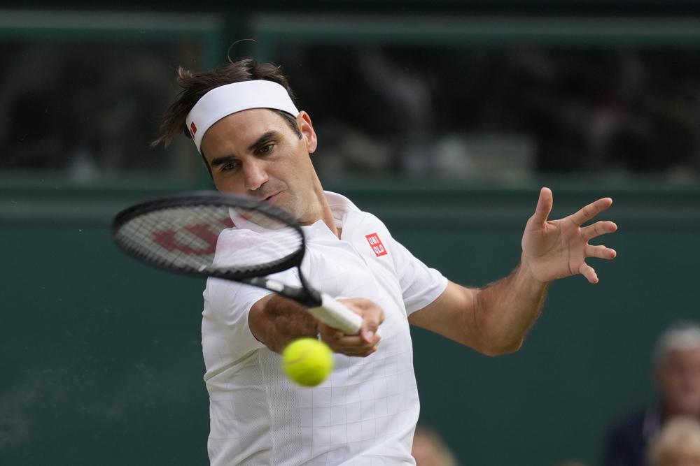 Federer en acción en Wimbledon