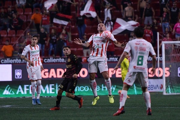 Necaxa en acción ante Tijuana en el AP22