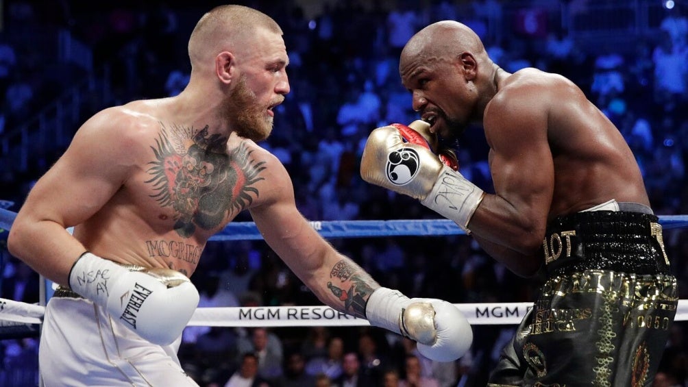 McGregor y Mayweather en su anterior combate  