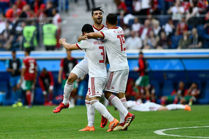 Jugadores de Irán festejando un gol