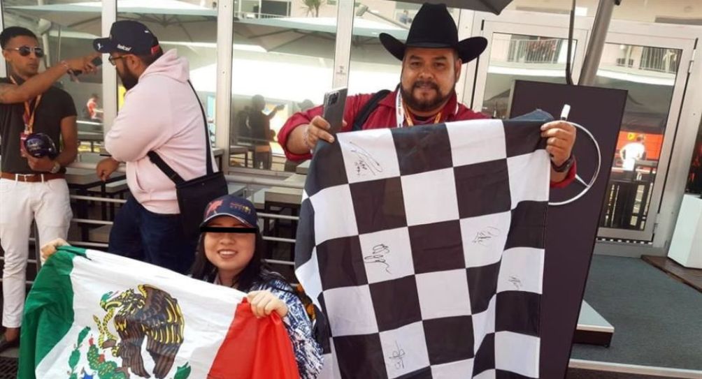 Fanática y su padre en el GP de México