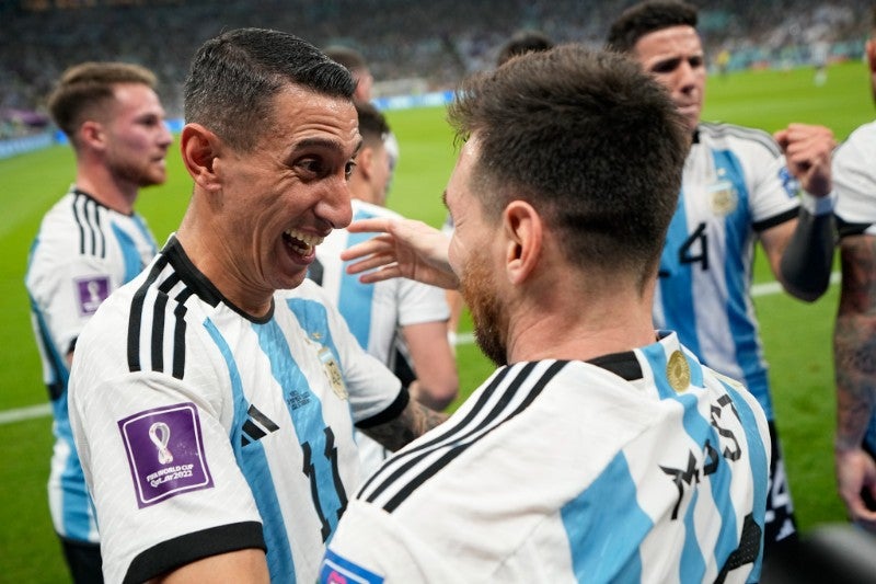 Di María y Messi festejando