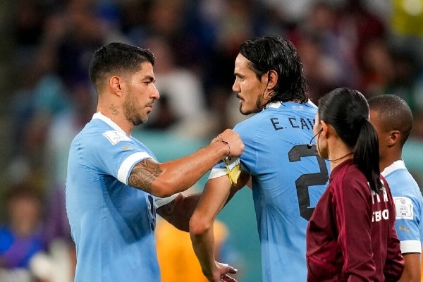 Luis Suárez junto a Cavani