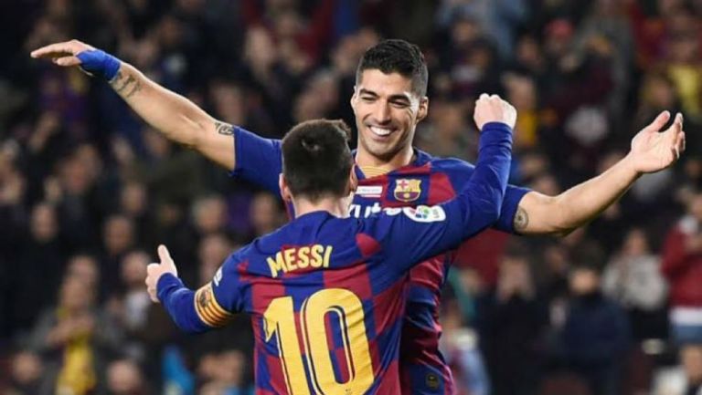 Messi y Suárez festejando un gol