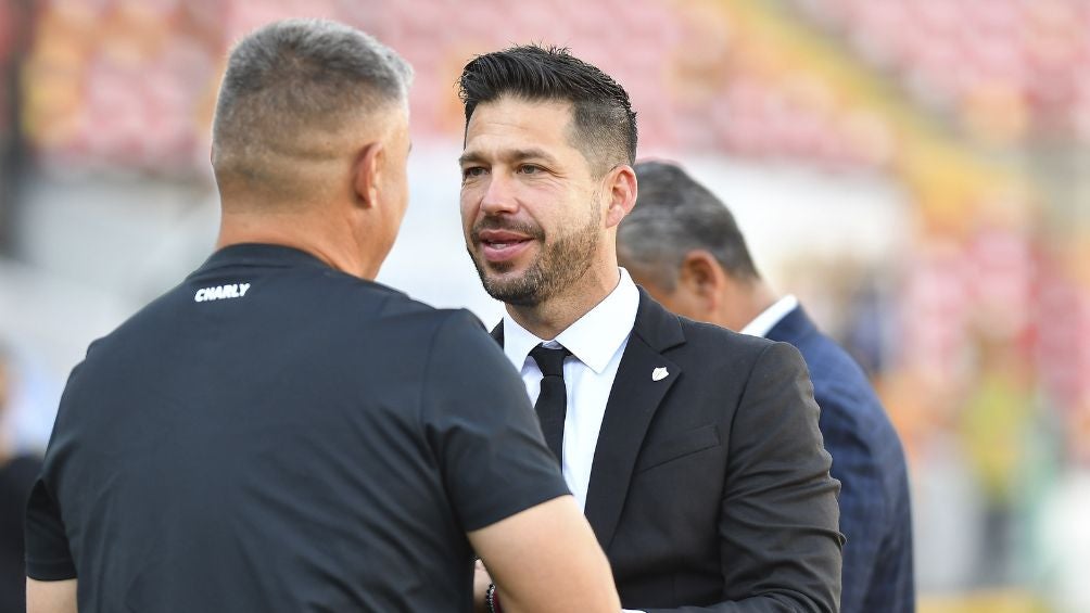 Mora y Mauro Gerk en el encuentro del pasado domingo