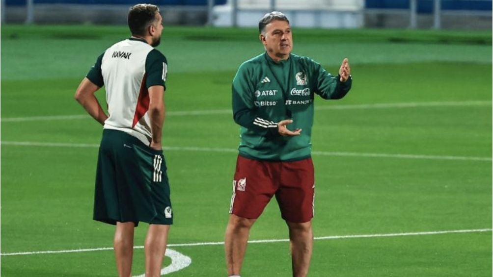 Herrera junto a Gerardo Martino