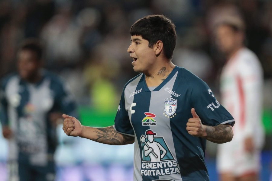 López celebrando anotación en partido con Pachuca 