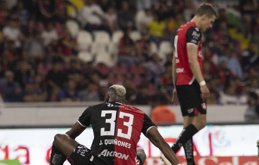 Quñones y Furch durante juego ante Tigres