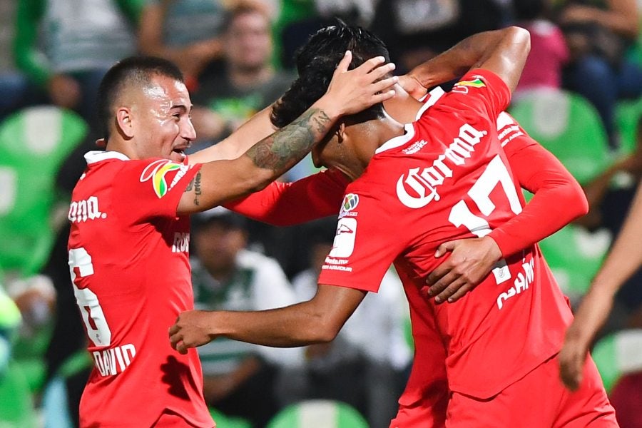 Los Diablos Rojos festejando gol 