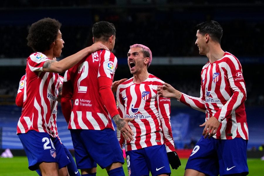 Los Colchoneros celebrando anotación en en Derby 