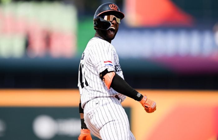 Jurickson Profar festejando su cuadrangular ante la selección de Panamá