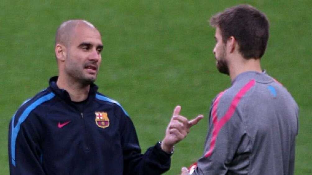 Guardiola con Piqué en el Barcelona