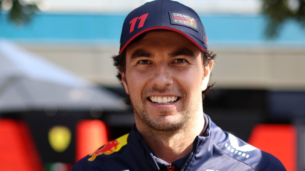 El piloto feliz en el paddock