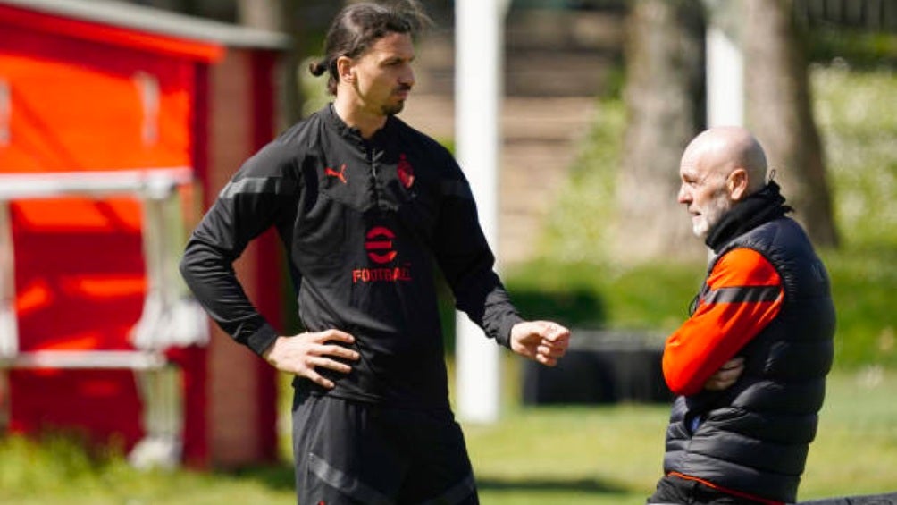 En charla con el técnico Pioli