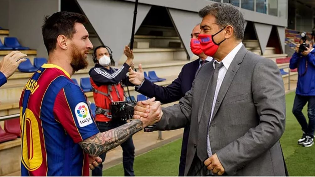 Messi y Joan Laporta cuando el argentino estaba en el Barcelona