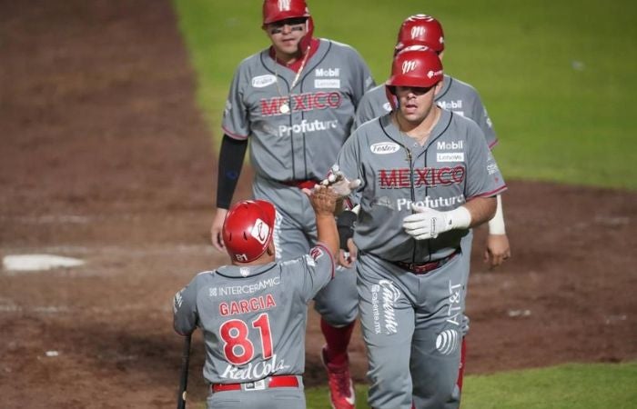 Jugadores de Diablos celebrando un cuadrangular