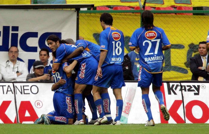 Jugadores de Tigres celebrando 'El Aztecazo'