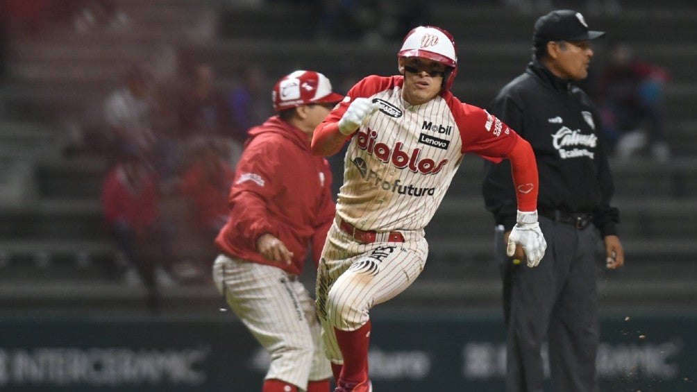 Mexico City, Mexico, July 18, 2021: Jesus Fabela #36 of the Diablos Rojos  catches the ball during the match between Diablos Rojos and Monclova  Acereros of the Mexican Baseball League at Alfredo