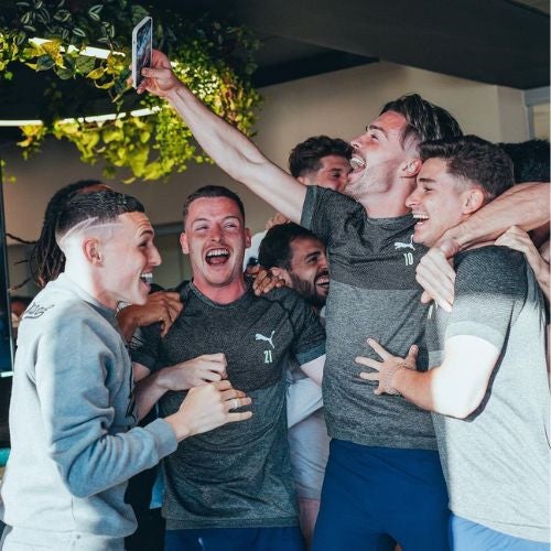 Jugadores del Manchester City celebrando el tricampeonato de PL