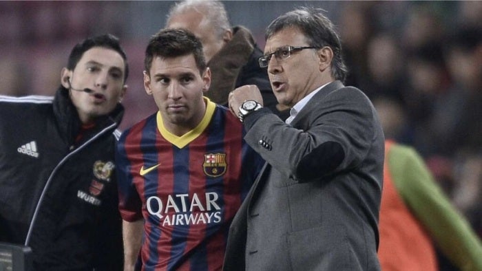 Tata Martino y Messi en el Barcelona