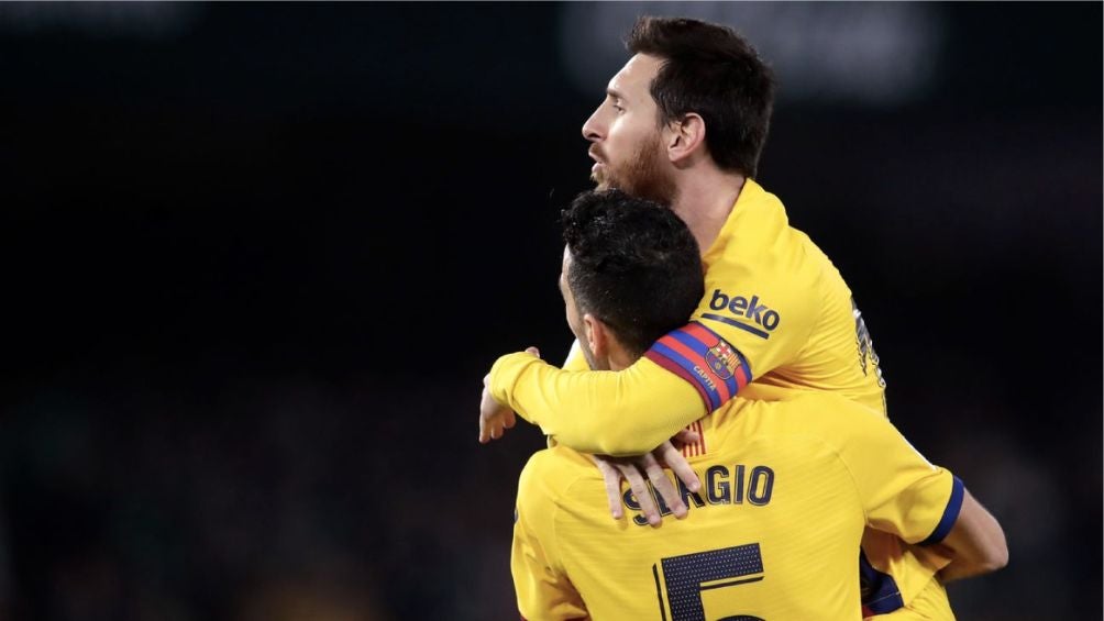 Messi y Sergio Busquets