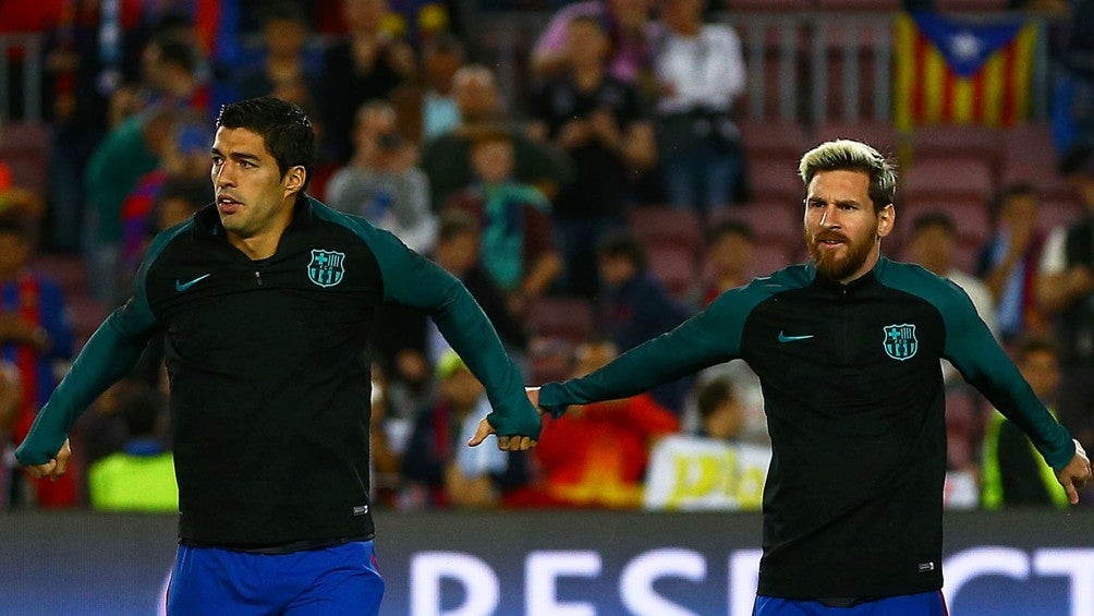 Luis Suárez junto a Lionel Messi en Barcelona