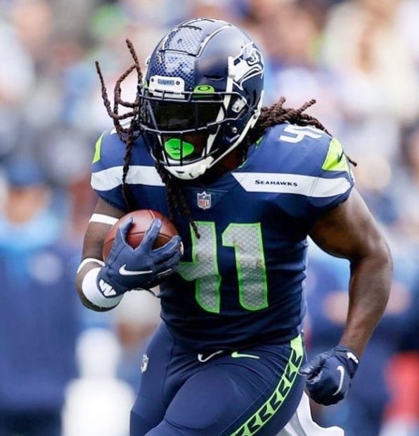 Alex Collins durante un partido