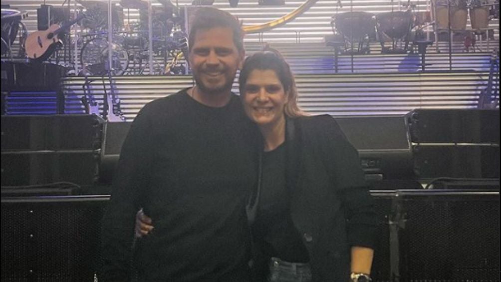 Vignolo y su esposa en el show de Luis Miguel