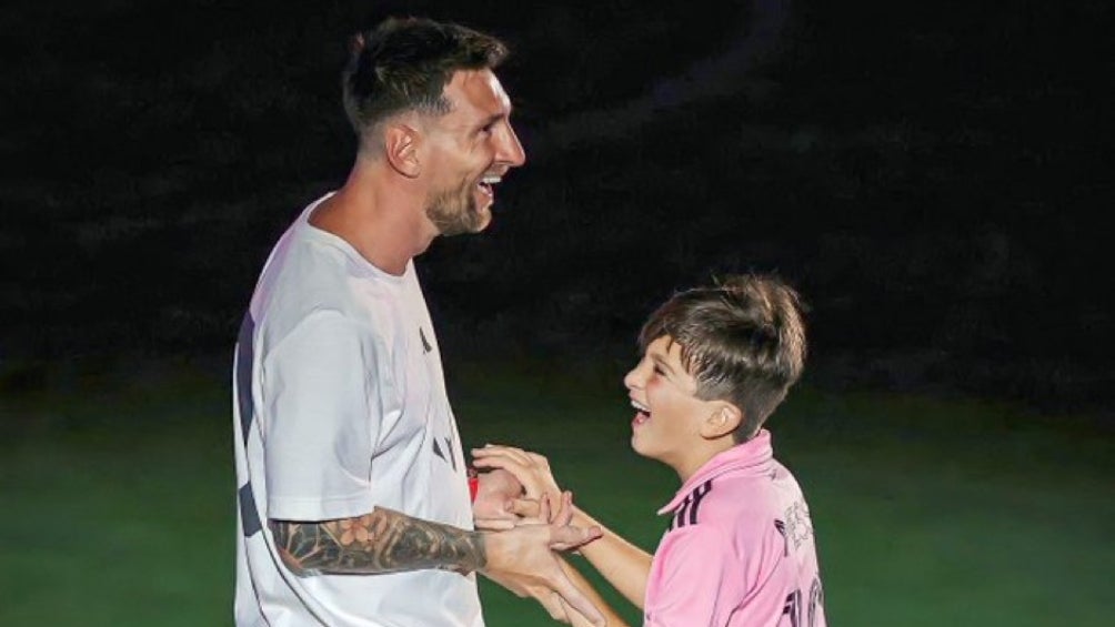 Messi y Thiago en el estadio 