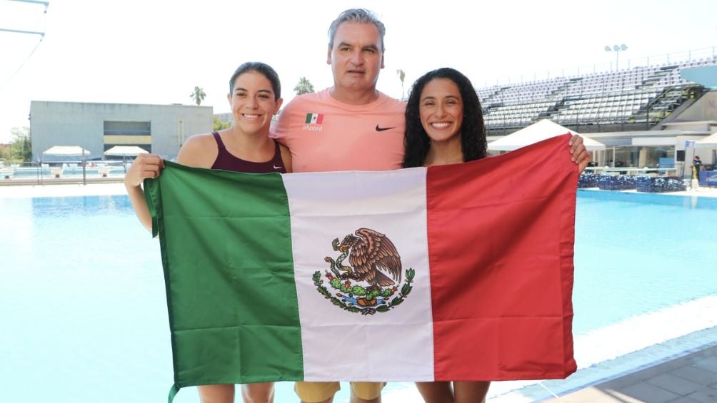 Orozco, Agunez y su entrenador