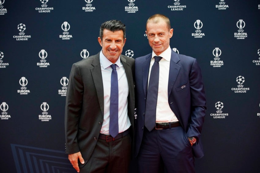 El presidente de la UEFA y Luis Figo