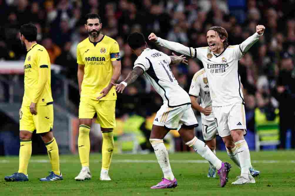 Modric y Rodrygo en celebración de gol