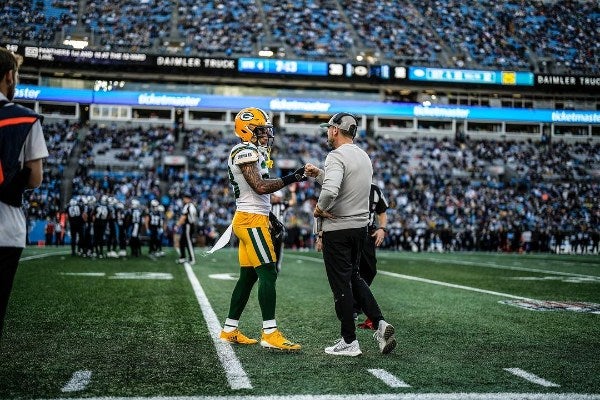 Jaire Alexander junto a Matt LaFleur 